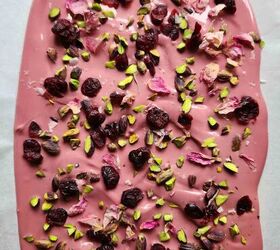 ruby chocolate bark pink chocolate bark, Melted ruby chocolate with toppings on parchment paper