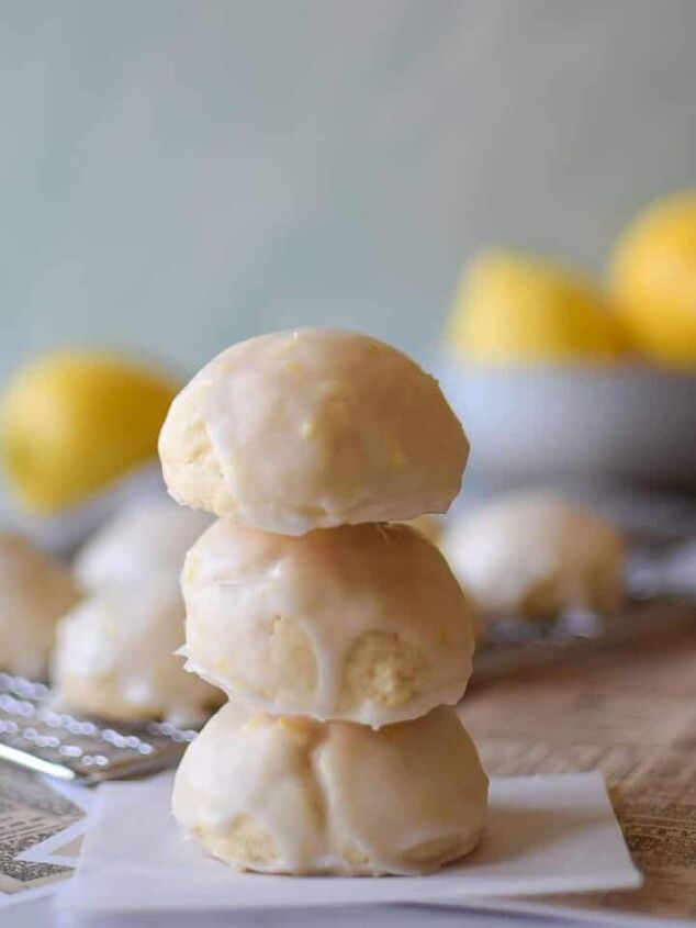 easy lemon pizzelle italian waffle cookies, Italian lemon drop cookies stacked with 3 cookes and lemons in the background