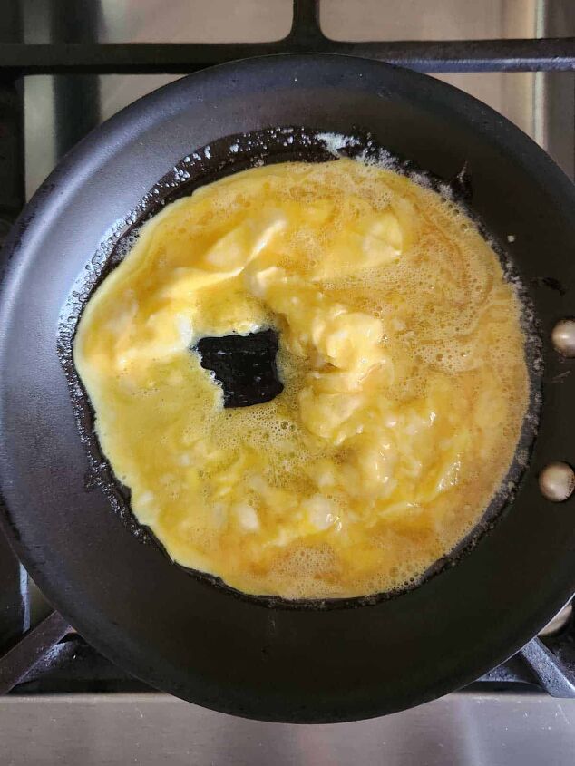 goat cheese scrambled eggs, Making curds for scrambled eggs in a skillet