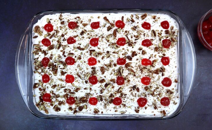 banana split cake recipe with no cream cheese, pecans sprinkled on top of the cake