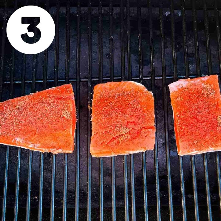 best smoked salmon on pellet grill recipe, Prepared salmon fillets placed on the grill grates of a pellet grill
