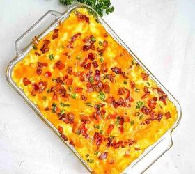 easy twice baked mashed potato recipe, An overhead picture of the cooked mashed potato casserole in a glass baking dish