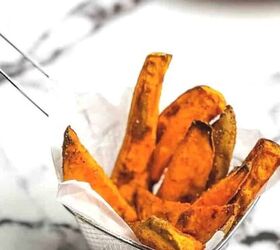 easy twice baked mashed potato recipe, A closeup of sweet potato wedges in a fry basket