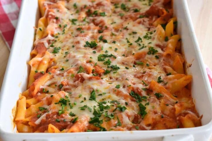 baked penne with ricotta easy 5 ingredient recipe, Baked Penne with ricotta in a white casserole dish with parsley sprinkled on top