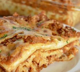 baked penne with ricotta easy 5 ingredient recipe, veggie lasagne on a white plate with a pan of it in the background