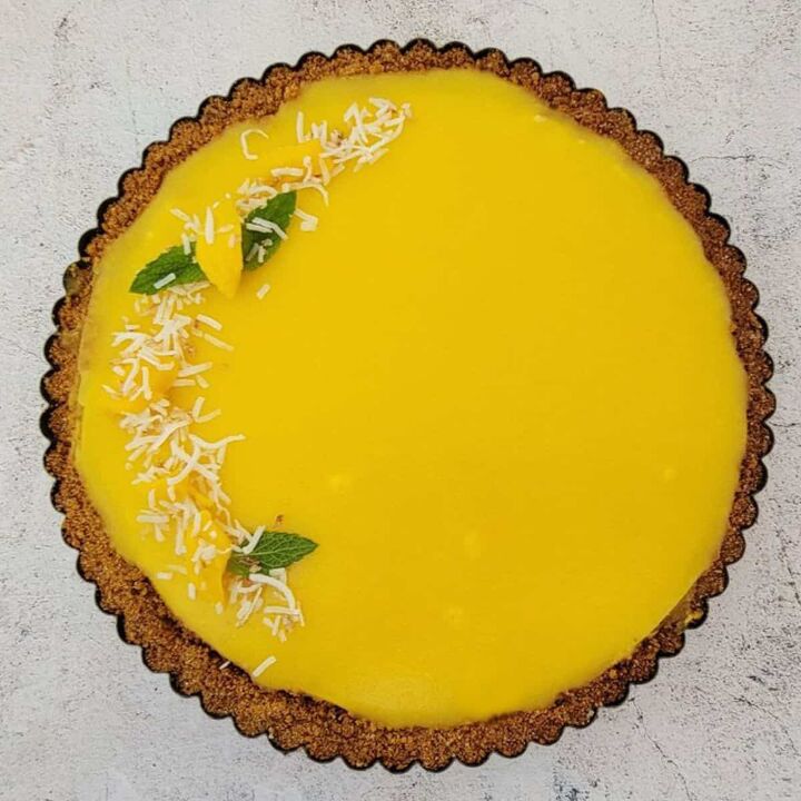 old fashioned coconut custard pie recipe, mango cream tart with graham crust overhead view