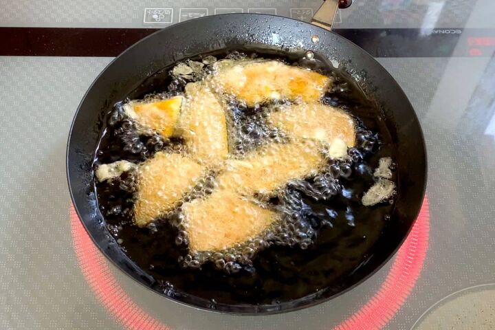 eggplant tempura, deep frying kabocha tempura in a frying pan