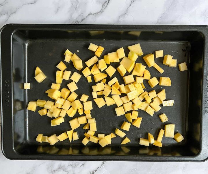 roasted swede oven and air fryer, Cubes of swede on a rectangular baking tray