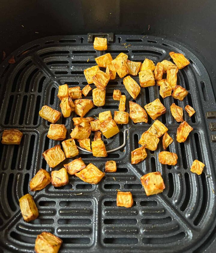roasted swede oven and air fryer, Cubes of cooked swede in an air fryer basket