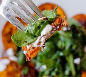spinach cranberry salad recipe, A forkful of arugula salad with goat cheese and sweet potato