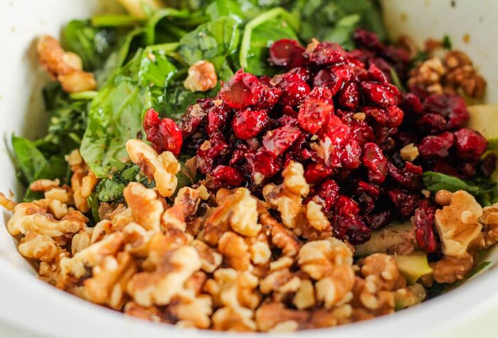 spinach cranberry salad recipe, Ingredients being tossed in a bowl