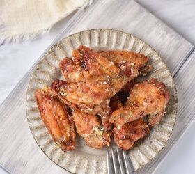 crispy garlic parmesan wings, Garlic Parmesan Wings on plate with fork