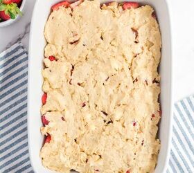 fresh strawberry cobbler, Cobbler dough spooned and spread over the strawberries in a large baking dish from above
