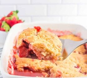 fresh strawberry cobbler, Strawberry cobbler being scooped from a pan from the side
