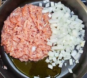 the best ground chicken soup recipe, Raw ground chicken olive oil and chopped onions in a skillet