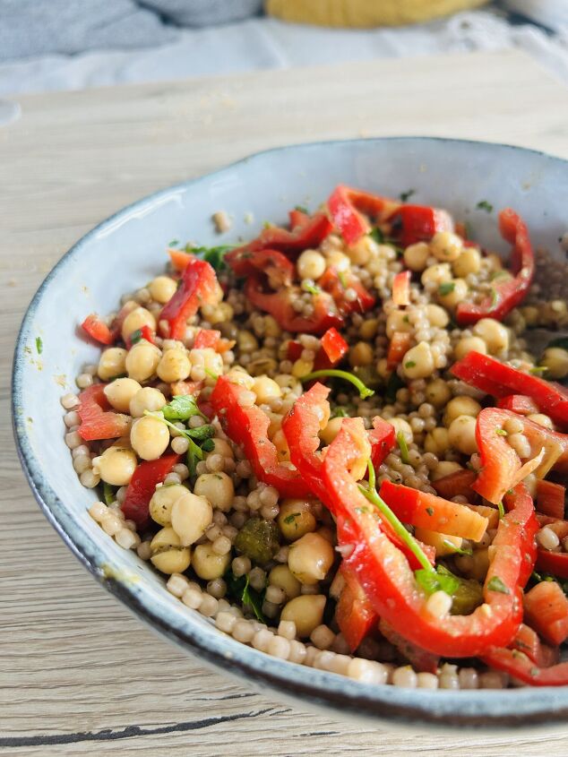 pesto giant couscous and red pepper salad with chickpeas and olives