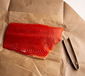 honey mustard salmon, Wild Salmon fillet with boning tweezers at the ready