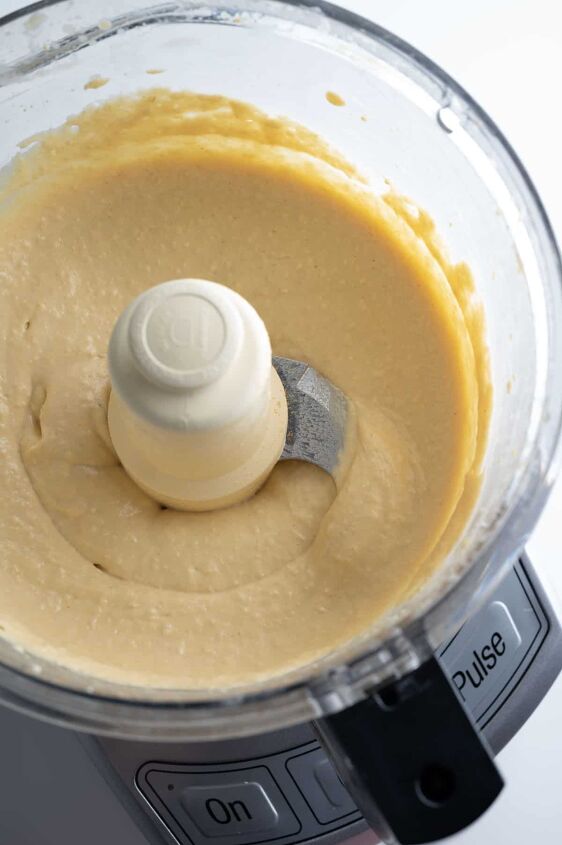 easy homemade hummus recipe without garlic, Blending all the ingredients in the food processor