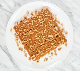 peanut butter brownie blondies, Peanut butter blondies topped with peanut butter and toasted crushed peanuts