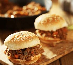 sloppy joes recipe easy saucy ground beef sandwich, Two sloppy Joes on a wooden cutting board