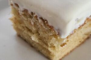 This scratch lemon cake recipe is light and fresh topped with a fabulous lemon whipped cream