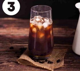 how to make the best iced coffee at home, A glass of ice cubes filled with cooled coffee