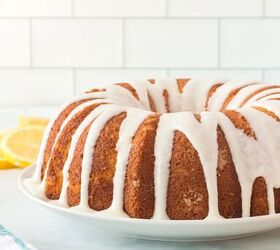 this lemon bundt cake recipe makes me happy, straight view of baked bundt bake with white icing drizzled on top