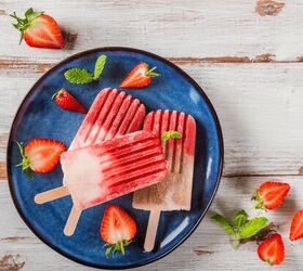 strawberry popsicles recipe popsicles with fresh strawberries, Three Strawberry Popsicles on a blue plate