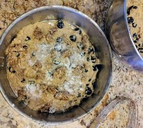 blueberry coffee cake without dairy or eggs, Blueberry coffee cake in pan with pastry blender and bowl of batter