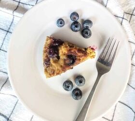 blueberry coffee cake without dairy or eggs, slice of instant pot blueberry coffee cake on white plate with fork and blueberries
