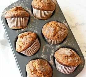 best jumbo pumpkin muffins recipe bakery style, Jumbo Pumpkin Muffins with Cinnamon Sugar in a grey muffin tin There is a white baking towel nearby