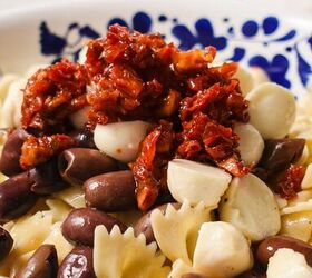 farfalle italian pasta salad, Pasta olives mozzarella and sun dried tomatoes in a bowl