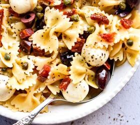 farfalle italian pasta salad, Close up shot of Italian bow tie pasta salad in a serving bowl