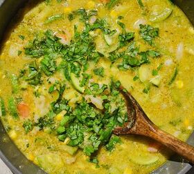 summer shrimp zucchini and corn chowder, simmering pot of shrimp zucchini corn chowder topped with cilantro