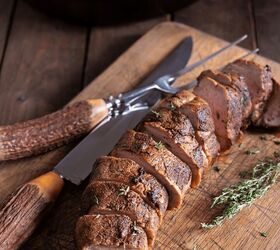 grilled pork tenderloin recipe juicy pork tenderloin, Sliced Grilled Pork Tenderloin on a wooden cutting board