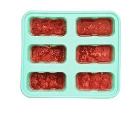 2 ingredient watermelon popsicles, watermelon mixture in popsicle molds