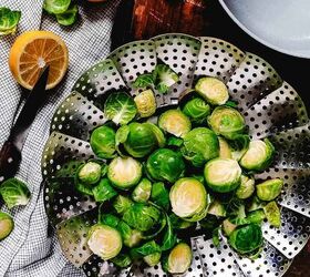 how to steam brussels sprouts, Halved brussels sprouts in steamer basket