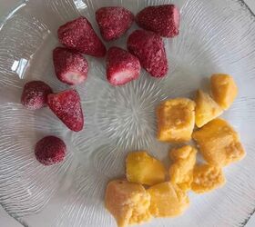 strawberry mango tajin margarita mocktails, frozen strawberry and mango pieces on glass plate