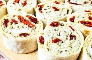 It only takes 5 ingredients to make these flavorful pesto sun dried tomato pinwheels