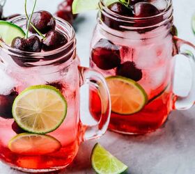 cherry limeade recipe refreshing summer drink, two glass mugs of cherry limeade