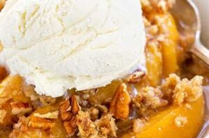 This peach crisp is a delicious dessert that combines juicy, sliced peaches with a crunchy, buttery topping