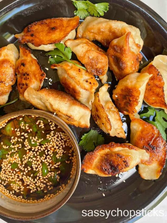 sticky baked asian chicken wings fall off the bone, pan fried dumplings