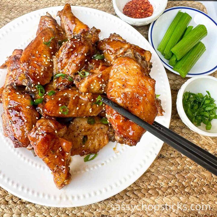 sticky baked asian chicken wings fall off the bone, wing close up