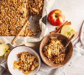 healthy apple crisp recipe easy and delicious, Overhead image of two servings of healthy apple crisp in bowls next to a baking dish