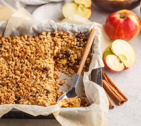 healthy apple crisp recipe easy and delicious, Healthy Apple Crisp in a baking dish with a serving spoon in it