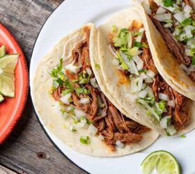 slow cooker barbacoa recipe crockpot beef barbacoa, overhead image of three slow cooker barbacoa tacos