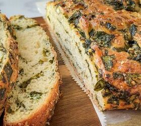 cheese bread recipe with spinach pesto, Sliced cheesy bread on a wood cutting board