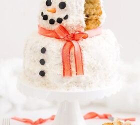 how to make a frosty snowman coconut bundt cake, side of a the snowman bundt cake with a slice missing