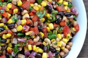 Cowboy caviar is an easy, light, and fresh dip that's perfect for parties, potlucks, and cookouts!