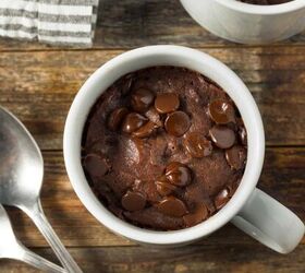 brownie in a mug microwave brownie recipe, Overhead image of a brownie in a mug on a wooden surface